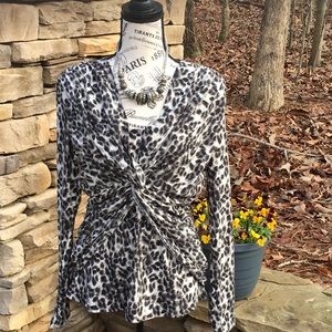 Animal print top with criss cross front.